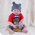 Реборн - Мальчик в полосатой пижаме и шапочке (56 см)